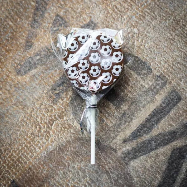 handmade chocolate lollipop with football print