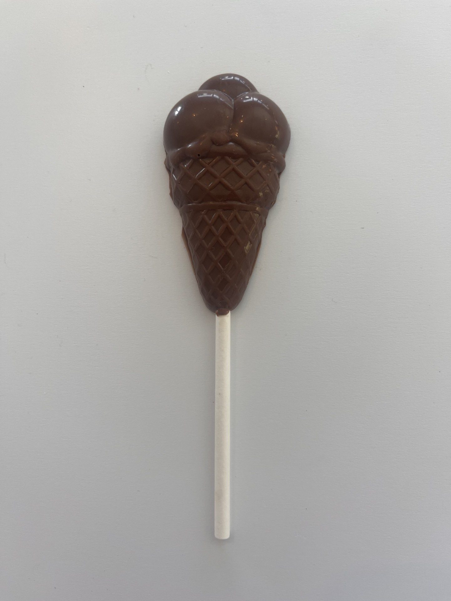 Ice-cream cone shaped milk chocolate lollipop