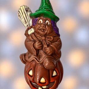 Scary Milk Chocolate Witch Sitting on Pumpkin